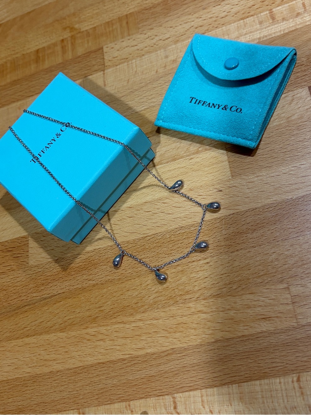 Tiffany & Co. Silver Teardrop Station Necklace with Signature Blue Accents
